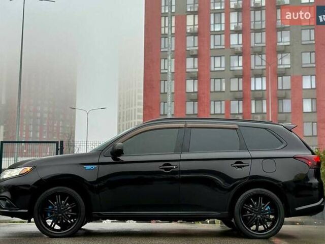 Чорний Міцубісі Аутлендер, об'ємом двигуна 2 л та пробігом 79 тис. км за 22900 $, фото 7 на Automoto.ua