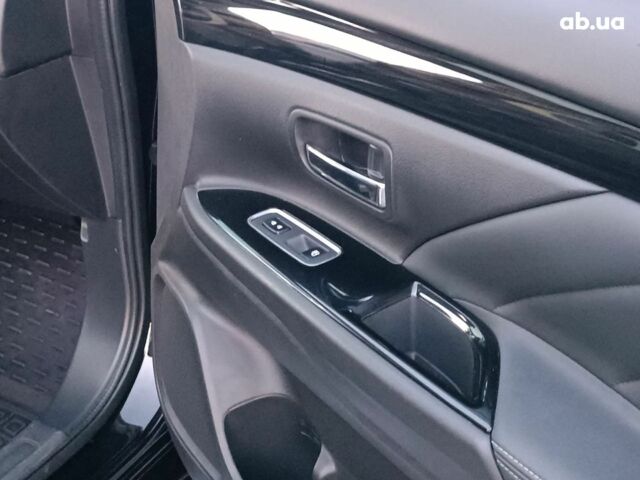 Черный Мицубиси Аутлендер, объемом двигателя 2 л и пробегом 115 тыс. км за 23700 $, фото 32 на Automoto.ua