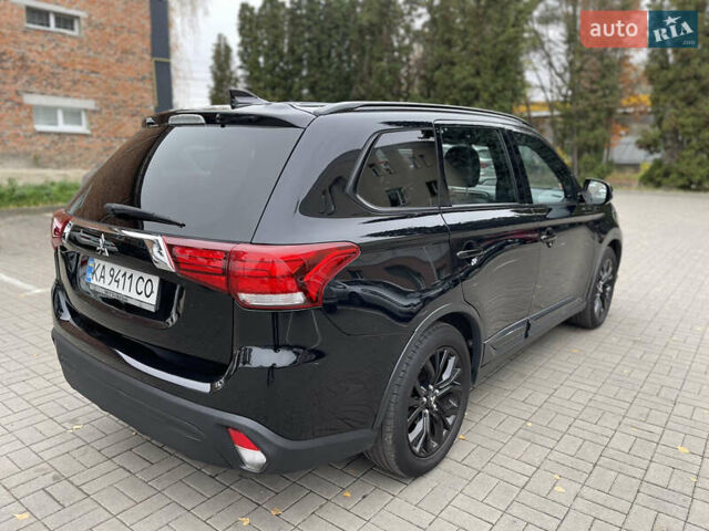 Чорний Міцубісі Аутлендер, об'ємом двигуна 2.36 л та пробігом 153 тис. км за 16450 $, фото 4 на Automoto.ua