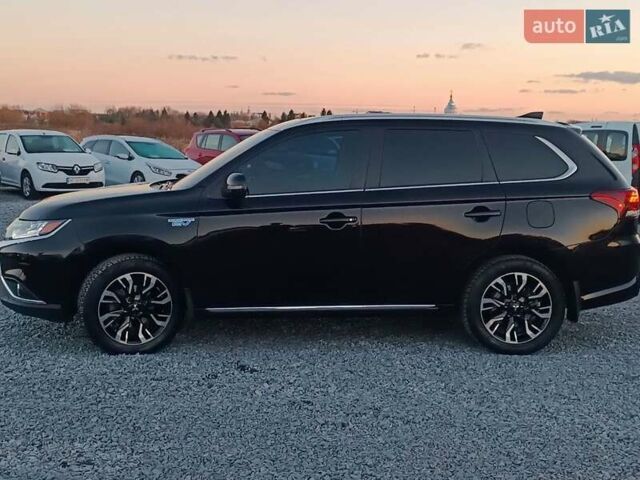 Чорний Міцубісі Аутлендер, об'ємом двигуна 2 л та пробігом 115 тис. км за 23700 $, фото 2 на Automoto.ua
