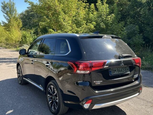 Черный Мицубиси Аутлендер, объемом двигателя 2 л и пробегом 54 тыс. км за 20800 $, фото 3 на Automoto.ua