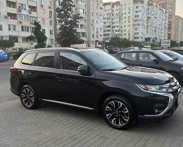 Чорний Міцубісі Аутлендер, об'ємом двигуна 2 л та пробігом 155 тис. км за 22500 $, фото 17 на Automoto.ua