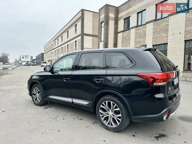 Чорний Міцубісі Аутлендер, об'ємом двигуна 2.36 л та пробігом 169 тис. км за 13450 $, фото 9 на Automoto.ua