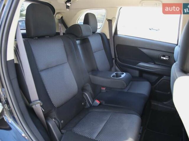 Черный Мицубиси Аутлендер, объемом двигателя 2.4 л и пробегом 130 тыс. км за 16200 $, фото 8 на Automoto.ua