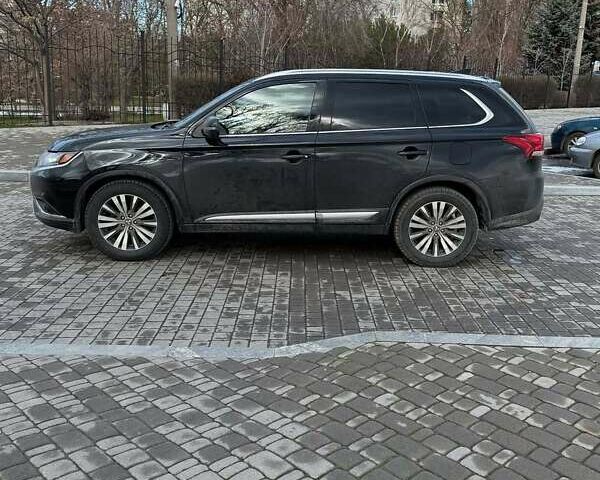 Черный Мицубиси Аутлендер, объемом двигателя 2.36 л и пробегом 91 тыс. км за 18300 $, фото 7 на Automoto.ua