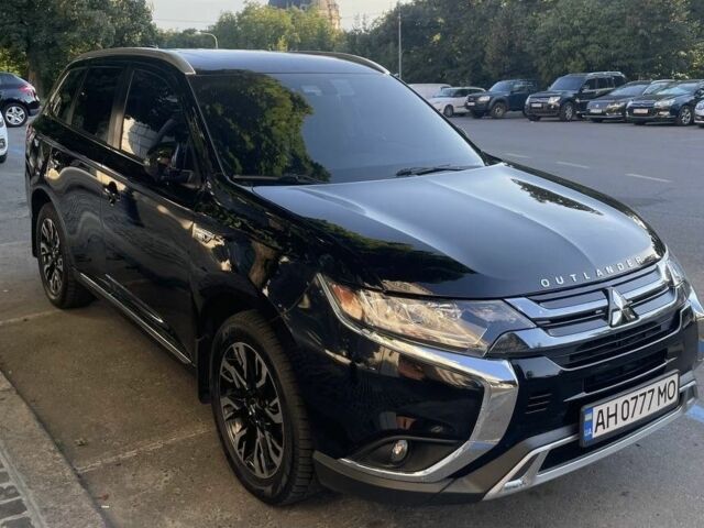 Чорний Міцубісі Аутлендер, об'ємом двигуна 2 л та пробігом 103 тис. км за 23500 $, фото 5 на Automoto.ua