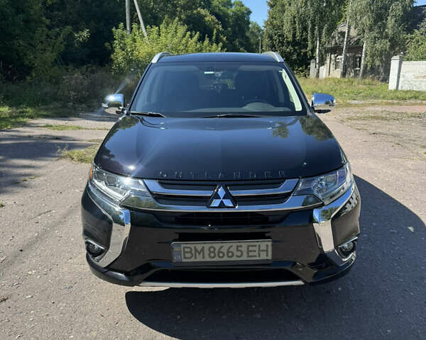 Черный Мицубиси Аутлендер, объемом двигателя 2 л и пробегом 54 тыс. км за 21500 $, фото 2 на Automoto.ua