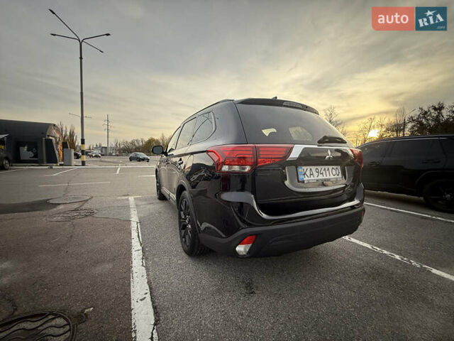 Черный Мицубиси Аутлендер, объемом двигателя 2.36 л и пробегом 153 тыс. км за 14800 $, фото 8 на Automoto.ua