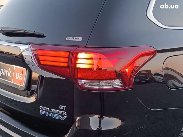 Черный Мицубиси Аутлендер, объемом двигателя 2 л и пробегом 115 тыс. км за 23700 $, фото 8 на Automoto.ua