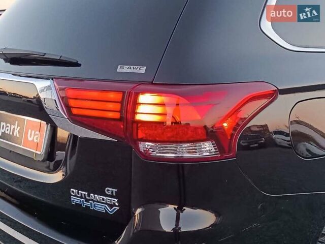 Чорний Міцубісі Аутлендер, об'ємом двигуна 2 л та пробігом 115 тис. км за 23700 $, фото 8 на Automoto.ua