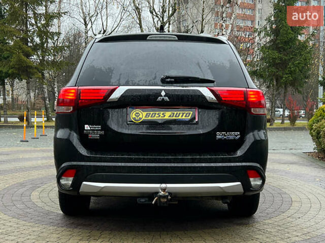 Черный Мицубиси Аутлендер, объемом двигателя 2 л и пробегом 96 тыс. км за 22750 $, фото 5 на Automoto.ua