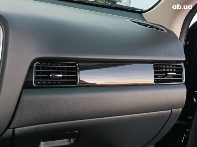 Черный Мицубиси Аутлендер, объемом двигателя 2 л и пробегом 115 тыс. км за 23700 $, фото 24 на Automoto.ua