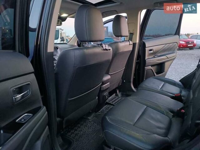 Чорний Міцубісі Аутлендер, об'ємом двигуна 2 л та пробігом 115 тис. км за 23700 $, фото 37 на Automoto.ua