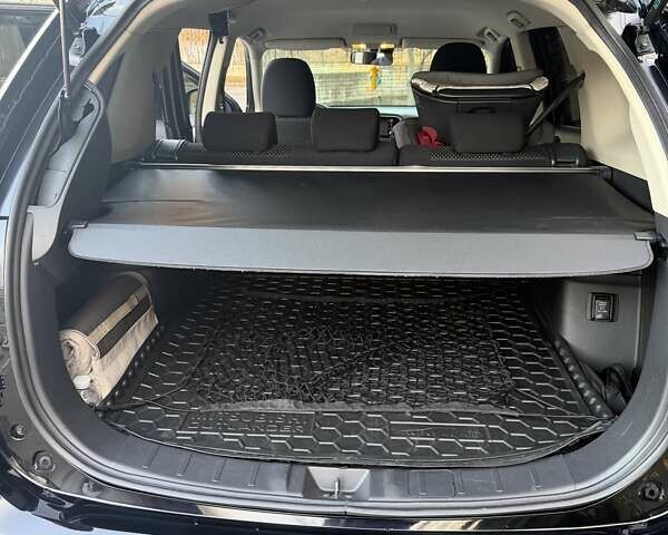 Чорний Міцубісі Аутлендер, об'ємом двигуна 2 л та пробігом 81 тис. км за 18950 $, фото 6 на Automoto.ua