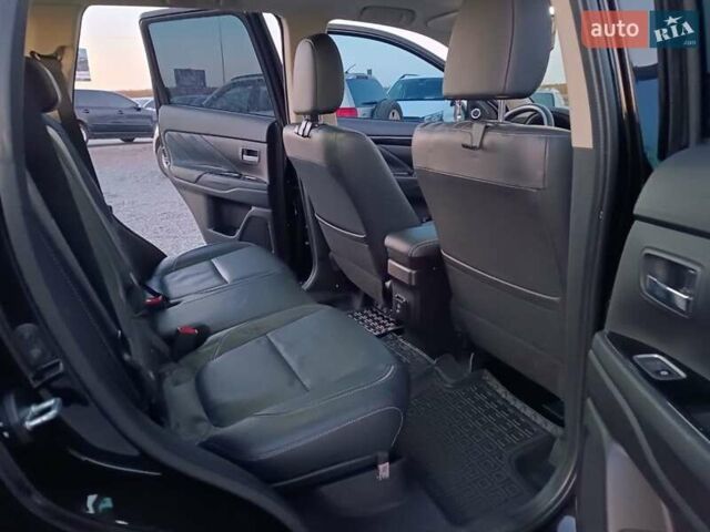 Чорний Міцубісі Аутлендер, об'ємом двигуна 2 л та пробігом 115 тис. км за 23700 $, фото 36 на Automoto.ua