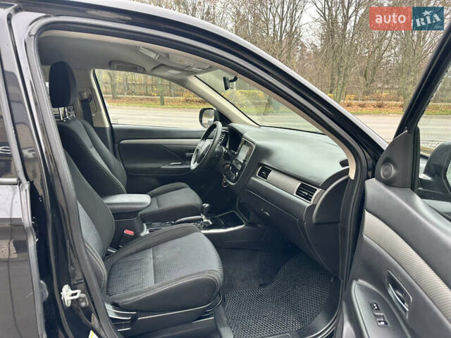 Чорний Міцубісі Аутлендер, об'ємом двигуна 2.36 л та пробігом 169 тис. км за 13450 $, фото 22 на Automoto.ua