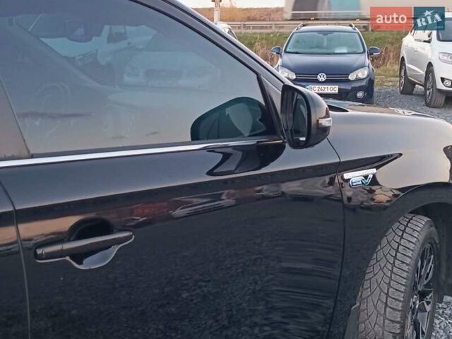 Чорний Міцубісі Аутлендер, об'ємом двигуна 2 л та пробігом 115 тис. км за 23700 $, фото 11 на Automoto.ua