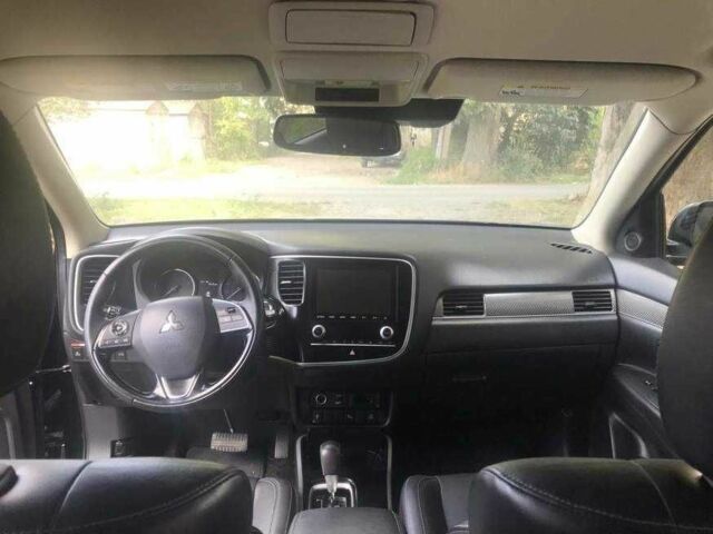 Черный Мицубиси Аутлендер, объемом двигателя 2.4 л и пробегом 125 тыс. км за 11200 $, фото 11 на Automoto.ua