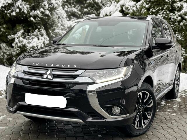 Черный Мицубиси Аутлендер, объемом двигателя 2 л и пробегом 65 тыс. км за 13200 $, фото 3 на Automoto.ua