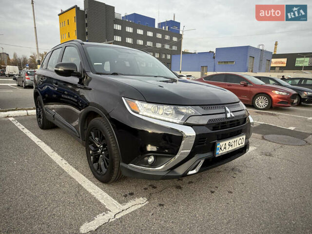 Черный Мицубиси Аутлендер, объемом двигателя 2.36 л и пробегом 153 тыс. км за 14800 $, фото 6 на Automoto.ua
