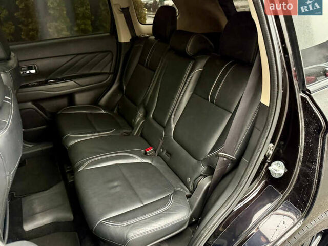Чорний Міцубісі Аутлендер, об'ємом двигуна 2 л та пробігом 79 тис. км за 22900 $, фото 32 на Automoto.ua