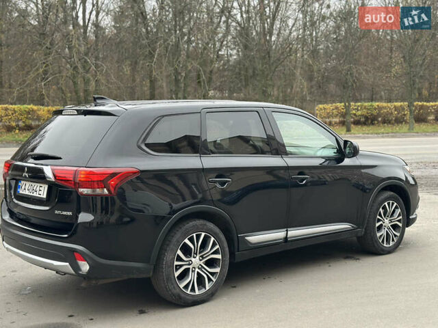 Чорний Міцубісі Аутлендер, об'ємом двигуна 2.36 л та пробігом 169 тис. км за 13450 $, фото 6 на Automoto.ua