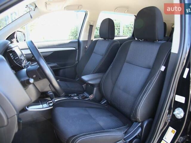 Черный Мицубиси Аутлендер, объемом двигателя 2.4 л и пробегом 130 тыс. км за 16200 $, фото 6 на Automoto.ua