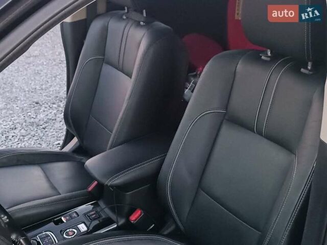 Чорний Міцубісі Аутлендер, об'ємом двигуна 2 л та пробігом 115 тис. км за 23700 $, фото 28 на Automoto.ua