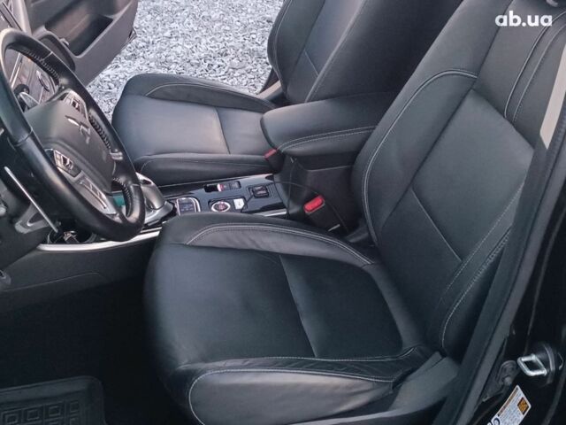 Черный Мицубиси Аутлендер, объемом двигателя 2 л и пробегом 115 тыс. км за 23700 $, фото 27 на Automoto.ua