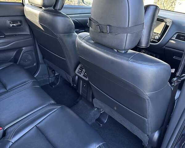 Черный Мицубиси Аутлендер, объемом двигателя 2.36 л и пробегом 90 тыс. км за 26500 $, фото 24 на Automoto.ua