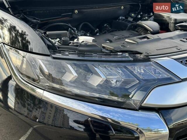 Черный Мицубиси Аутлендер, объемом двигателя 2.36 л и пробегом 90 тыс. км за 26500 $, фото 46 на Automoto.ua