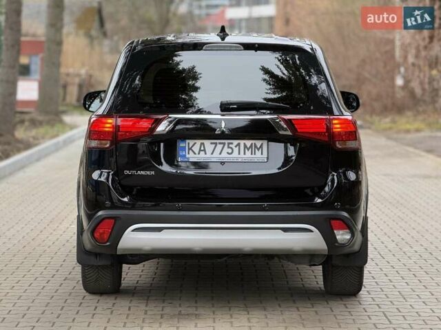 Черный Мицубиси Аутлендер, объемом двигателя 2 л и пробегом 65 тыс. км за 19950 $, фото 7 на Automoto.ua