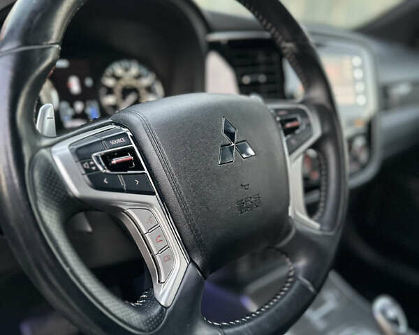 Чорний Міцубісі Аутлендер, об'ємом двигуна 2.36 л та пробігом 66 тис. км за 19800 $, фото 14 на Automoto.ua
