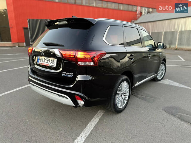 Чорний Міцубісі Аутлендер, об'ємом двигуна 2.36 л та пробігом 66 тис. км за 19800 $, фото 7 на Automoto.ua