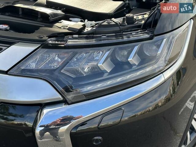 Черный Мицубиси Аутлендер, объемом двигателя 2.36 л и пробегом 90 тыс. км за 26500 $, фото 45 на Automoto.ua