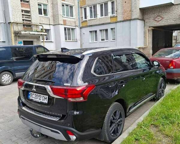 Черный Мицубиси Аутлендер, объемом двигателя 2.36 л и пробегом 67 тыс. км за 25925 $, фото 3 на Automoto.ua