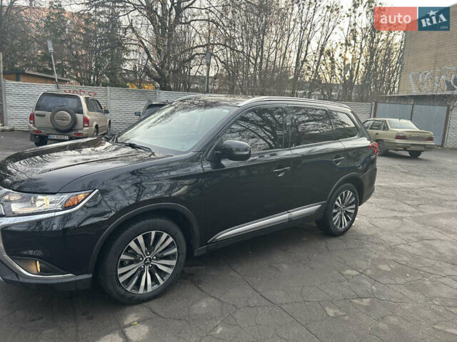 Черный Мицубиси Аутлендер, объемом двигателя 2.36 л и пробегом 67 тыс. км за 19500 $, фото 5 на Automoto.ua