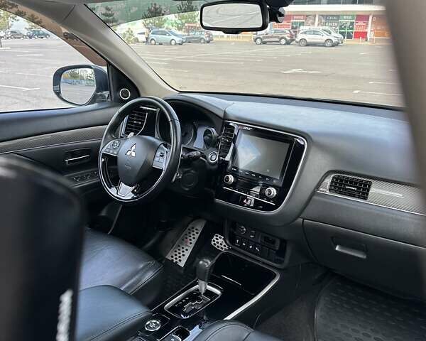 Черный Мицубиси Аутлендер, объемом двигателя 2.36 л и пробегом 90 тыс. км за 26500 $, фото 13 на Automoto.ua