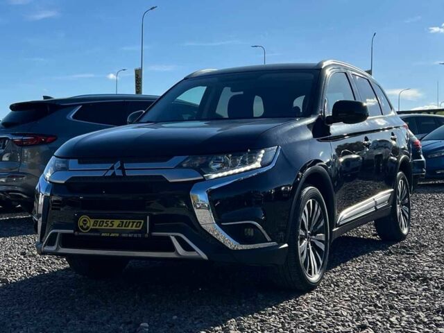 Чорний Міцубісі Аутлендер, об'ємом двигуна 2.4 л та пробігом 97 тис. км за 17700 $, фото 2 на Automoto.ua