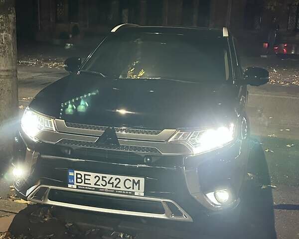 Черный Мицубиси Аутлендер, объемом двигателя 2.36 л и пробегом 90 тыс. км за 26500 $, фото 9 на Automoto.ua