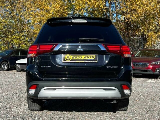 Чорний Міцубісі Аутлендер, об'ємом двигуна 2.4 л та пробігом 97 тис. км за 17700 $, фото 4 на Automoto.ua