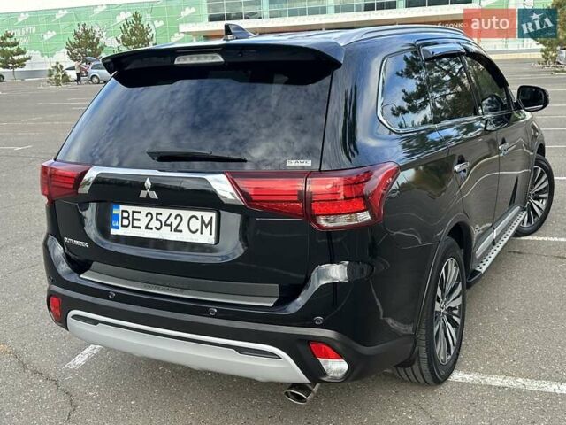 Черный Мицубиси Аутлендер, объемом двигателя 2.36 л и пробегом 90 тыс. км за 26500 $, фото 7 на Automoto.ua