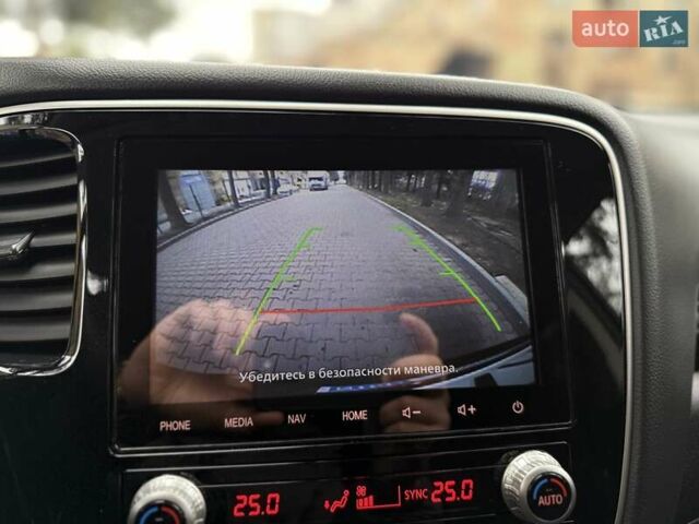 Черный Мицубиси Аутлендер, объемом двигателя 2 л и пробегом 65 тыс. км за 19950 $, фото 34 на Automoto.ua