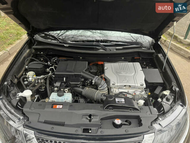 Черный Мицубиси Аутлендер, объемом двигателя 2 л и пробегом 148 тыс. км за 21800 $, фото 27 на Automoto.ua