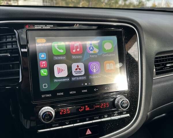 Черный Мицубиси Аутлендер, объемом двигателя 2.36 л и пробегом 90 тыс. км за 26500 $, фото 79 на Automoto.ua