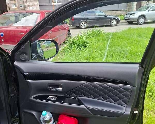 Черный Мицубиси Аутлендер, объемом двигателя 2.36 л и пробегом 67 тыс. км за 25925 $, фото 17 на Automoto.ua