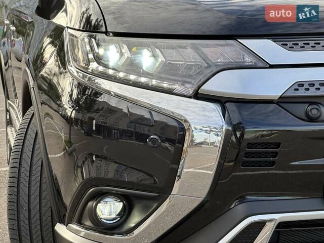 Черный Мицубиси Аутлендер, объемом двигателя 2.36 л и пробегом 90 тыс. км за 26500 $, фото 44 на Automoto.ua