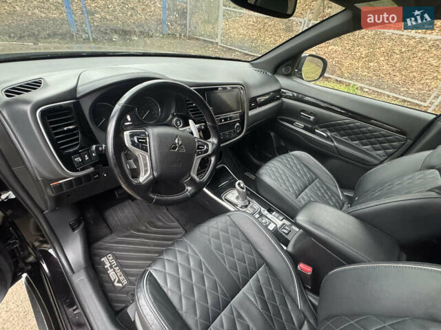 Черный Мицубиси Аутлендер, объемом двигателя 2 л и пробегом 148 тыс. км за 21800 $, фото 22 на Automoto.ua
