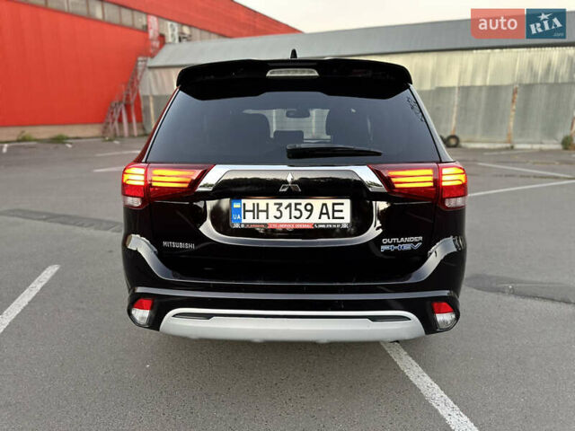 Чорний Міцубісі Аутлендер, об'ємом двигуна 2.36 л та пробігом 66 тис. км за 19800 $, фото 10 на Automoto.ua