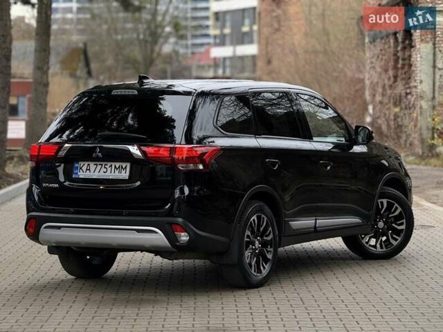 Черный Мицубиси Аутлендер, объемом двигателя 2 л и пробегом 65 тыс. км за 19950 $, фото 5 на Automoto.ua